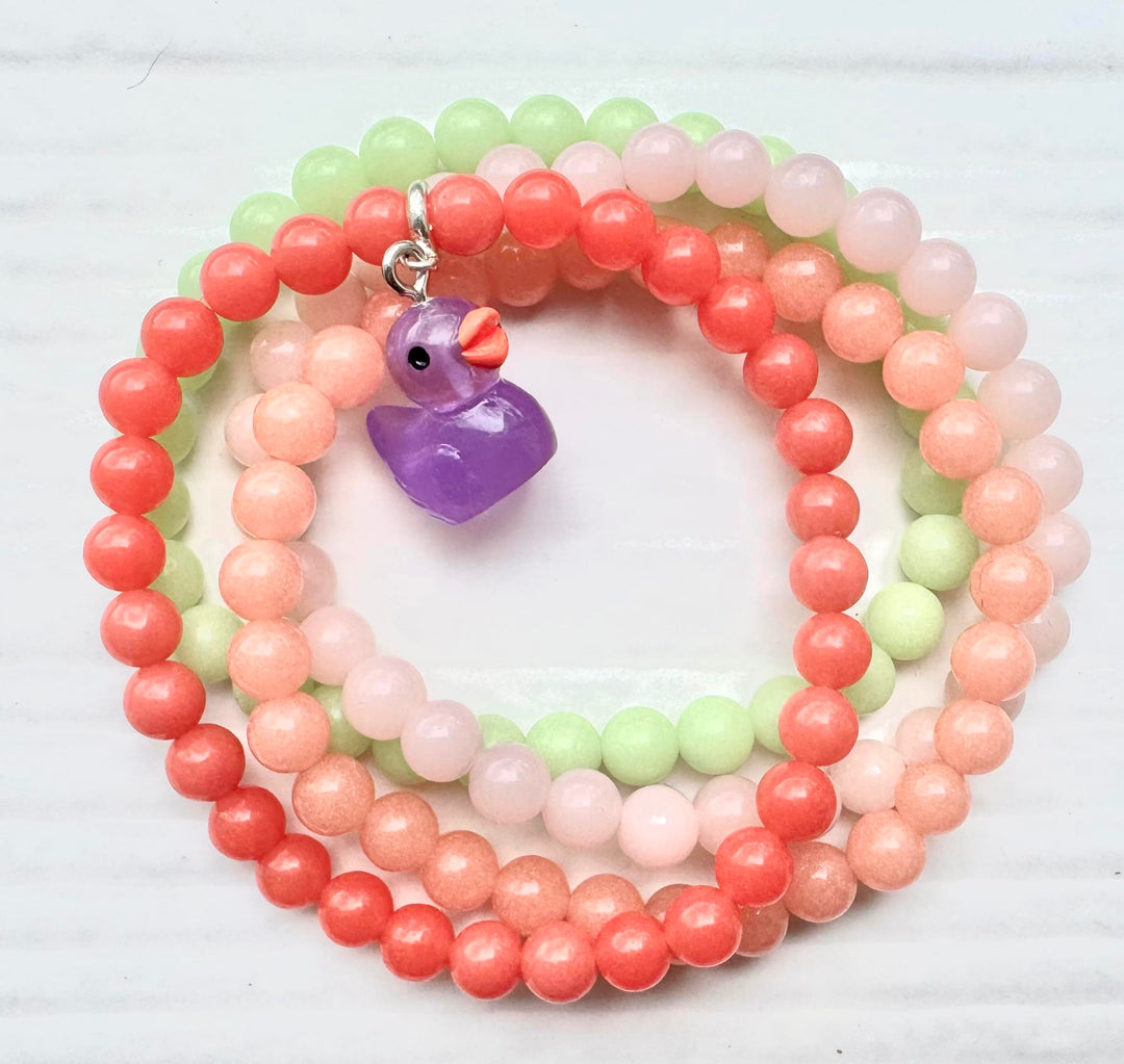 Glow Pink Bracelet Stack With Duck Charm 